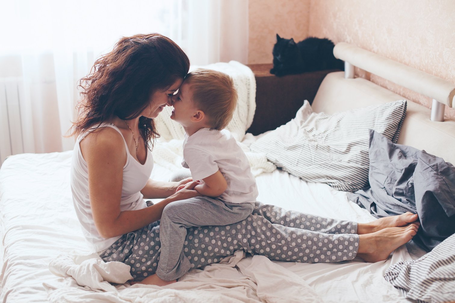 Mom Relaxing with Her Little Son